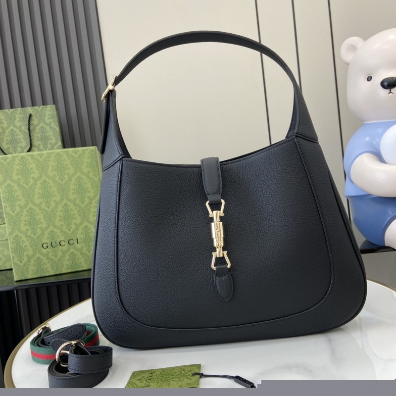 G*u*i top handle bags